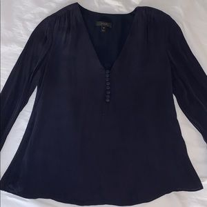 Like new navy silk blouse with button detailing